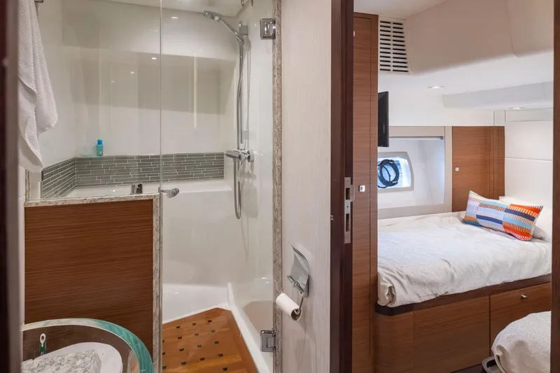 Crescent Moon Yacht Photos Pics Luxurious bathroom and bedroom interior of 2017 Ocean Alexander 70e yacht.