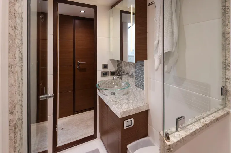 Crescent Moon Yacht Photos Pics Luxurious bathroom in 2017 Ocean Alexander 70e yacht with modern fixtures and elegant design.