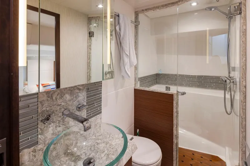 Crescent Moon Yacht Photos Pics Luxurious bathroom in 2017 Ocean Alexander 70e yacht, featuring modern fixtures and elegant design.