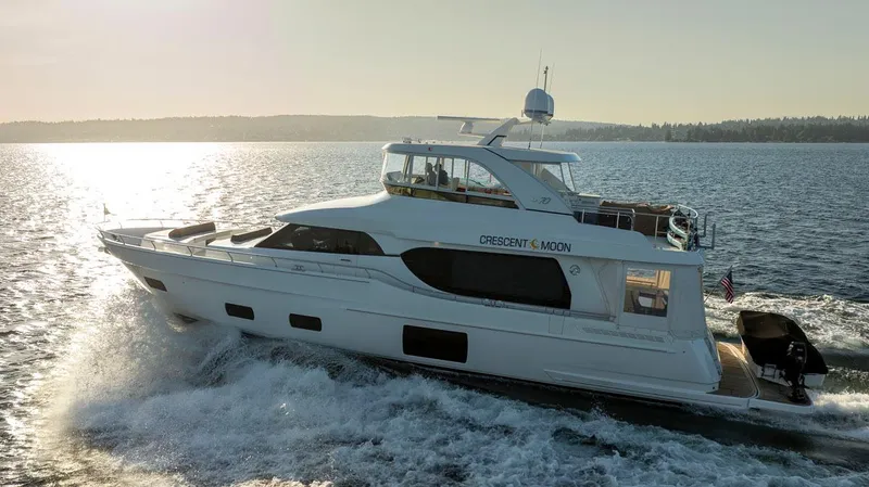 Crescent Moon Yacht Photos Pics 2017 Ocean Alexander 70E Motoryacht cruising on a sunny day.