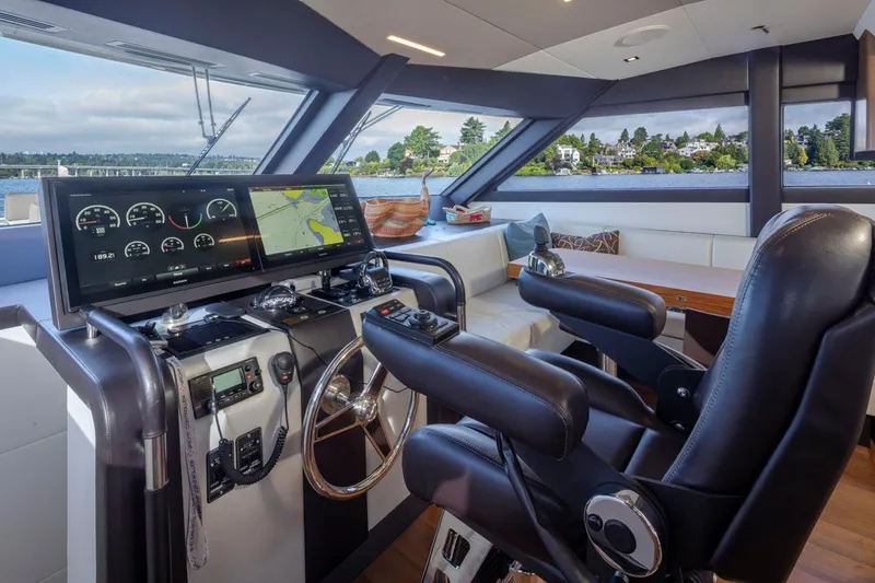 Crescent Moon Yacht Photos Pics Luxurious helm of 2017 Ocean Alexander 70E Motoryacht with advanced navigation systems.