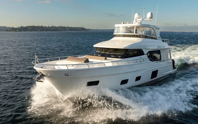 Crescent Moon Yacht Photos Pics 2017 Ocean Alexander 70E Motoryacht cruising on open water under clear skies.