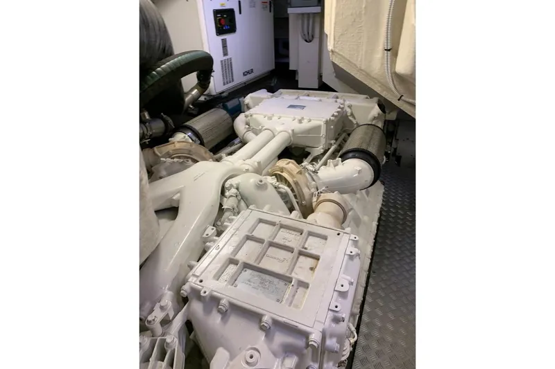  Yacht Photos Pics Engine room of 2017 Riva 76 Perseo yacht, showcasing mechanical components and systems.