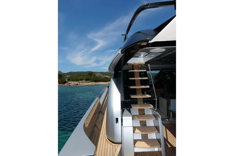  Yacht Photos Pics Luxury yacht Riva 76 Perseo 2017 with sleek design and elegant wooden stairs.