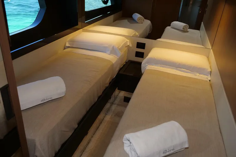  Yacht Photos Pics Luxurious twin cabin interior on 2017 Riva 76 Perseo yacht with elegant bedding.
