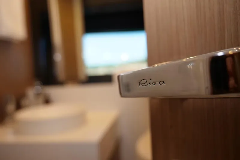  Yacht Photos Pics Interior of 2017 Riva 76 Perseo yacht, featuring elegant door handle design.
