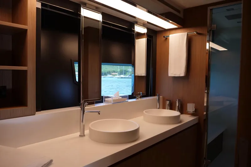  Yacht Photos Pics Luxurious bathroom on 2017 Riva 76 Perseo yacht with dual sinks and ocean view.