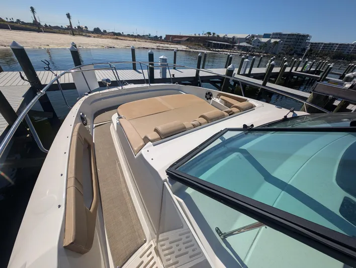  Yacht Photos Pics 2019 Sea Ray Sundancer 320 yacht with spacious deck and seating at marina.