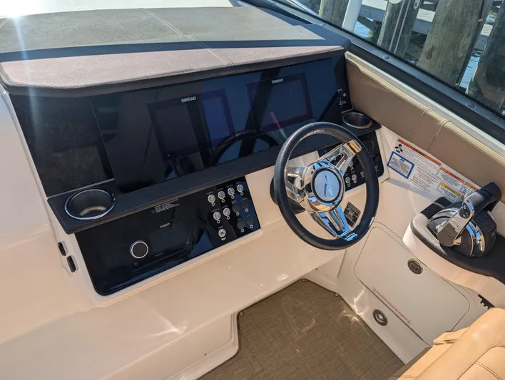  Yacht Photos Pics 2019 Sea Ray Sundancer 320 helm with modern controls and steering wheel.