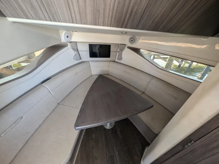  Yacht Photos Pics 2019 Sea Ray Sundancer 320 cabin interior with sleek seating and modern design.