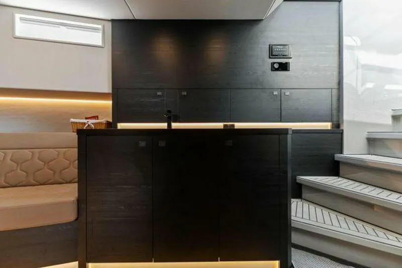 Incentivized Yacht Photos Pics Luxurious interior of 2021 Vanquish VQ58 yacht with modern design and ambient lighting.