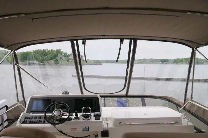 Necessity Yacht Photos Pics 2017 Sea Ray Fly 400 helm with panoramic water view.