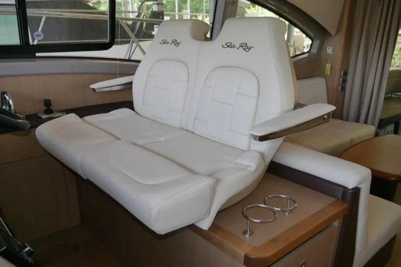 Necessity Yacht Photos Pics Luxurious interior seating of 2017 Sea Ray Fly 400 yacht with white leather upholstery.