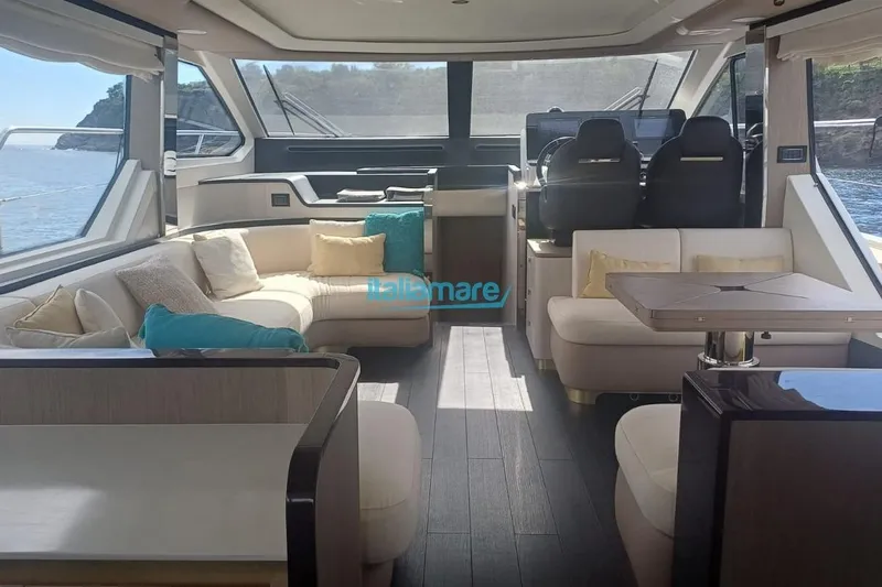  Yacht Photos Pics Luxurious interior of 2025 Azimut Fly 60 yacht with elegant seating and panoramic windows.