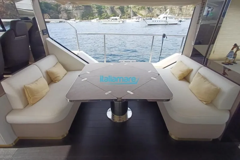  Yacht Photos Pics Luxurious seating area on 2025 Azimut Fly 60 yacht with ocean view.