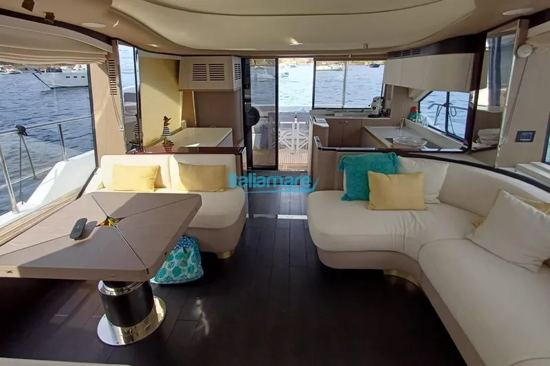 Yacht Photos Pics Luxurious interior of 2025 Azimut Fly 60 yacht with elegant seating and sea view.