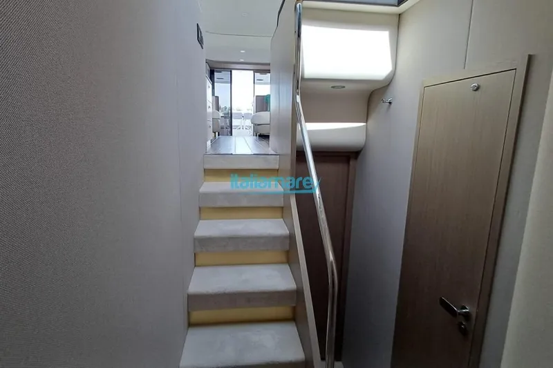  Yacht Photos Pics Staircase inside 2025 Azimut Fly 60 yacht, featuring modern design and sleek finishes.