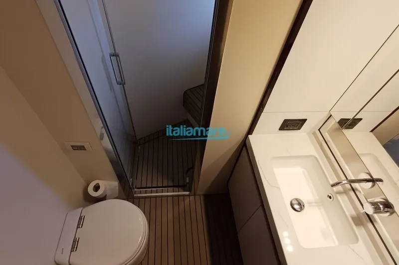  Yacht Photos Pics Modern bathroom interior of 2025 Azimut Fly 60 yacht, featuring sleek design and fixtures.