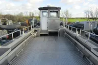 Aluminum boat deck with cabin, Robust LC1227, 2023 model, under cloudy sky.