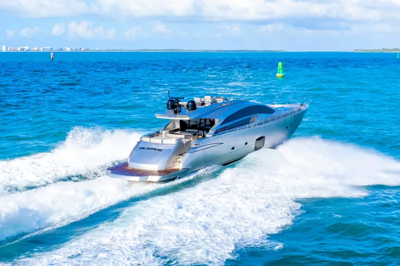  Yacht Photos Pics Luxury Pershing 82 yacht cruising on open sea, 2013 model, creating dynamic waves.