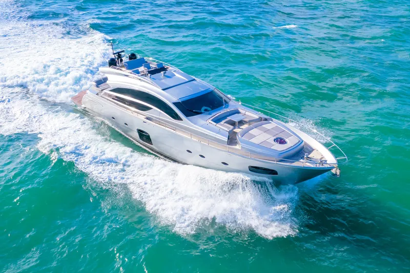  Yacht Photos Pics Luxury 2013 Pershing 82 yacht cruising on turquoise waters.