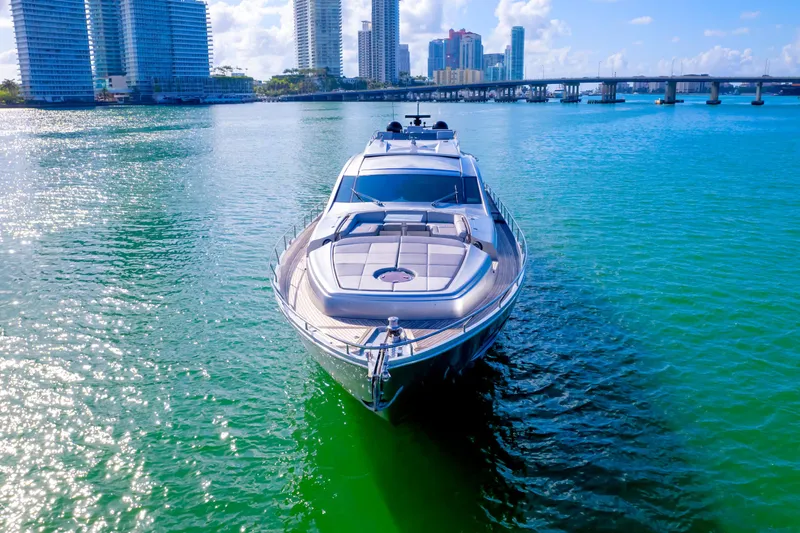  Yacht Photos Pics Luxurious 2013 Pershing 82 yacht cruising in a vibrant city waterfront.