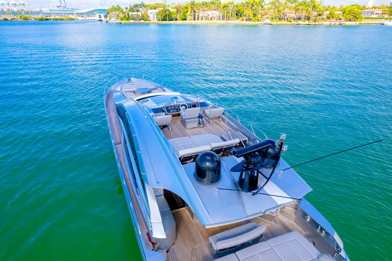  Yacht Photos Pics Luxurious 2013 Pershing 82 yacht on serene blue waters, showcasing sleek design and modern amenities.