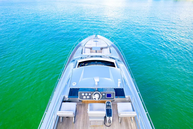  Yacht Photos Pics Luxury 2013 Pershing 82 yacht on serene blue-green water.