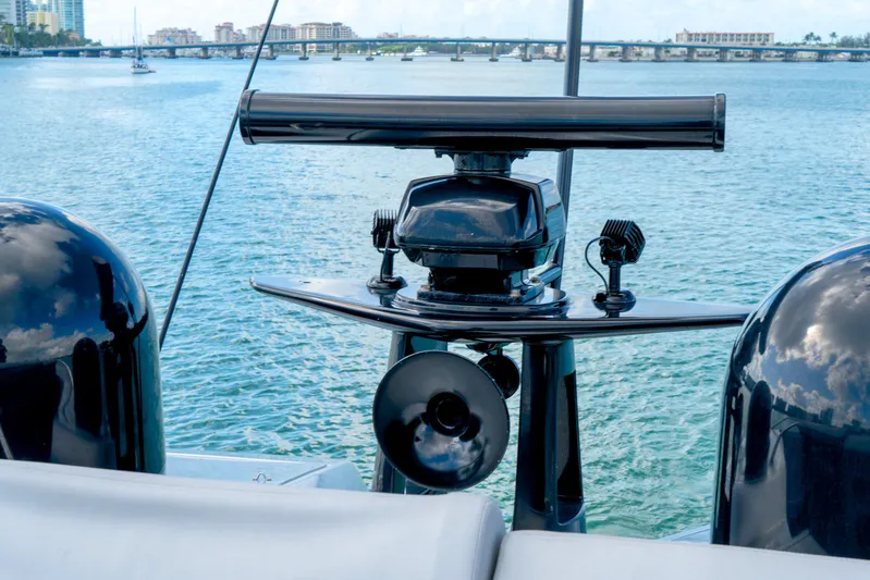  Yacht Photos Pics Radar equipment on a 2013 Pershing 82 yacht with scenic water backdrop.