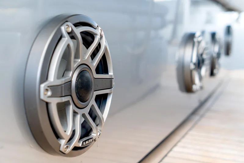  Yacht Photos Pics Close-up of marine speakers on a 2013 Pershing 82 yacht exterior.