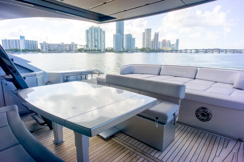  Yacht Photos Pics Luxurious 2013 Pershing 82 yacht deck with city skyline view.