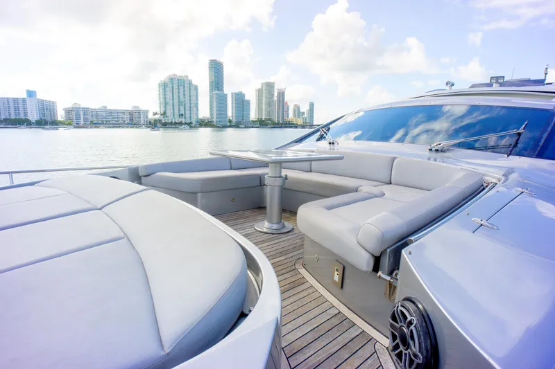  Yacht Photos Pics Luxurious 2013 Pershing 82 yacht deck with city skyline view.