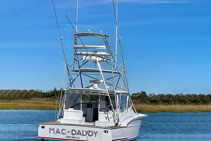 M.a.c. Daddy Yacht Photos Pics Custom 2005 DeSanti Carolina Express boat on calm water, Cape May, NJ.