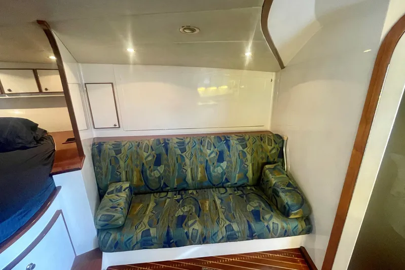 M.a.c. Daddy Yacht Photos Pics Cozy seating area in 2005 Custom DeSanti Carolina Express boat interior.