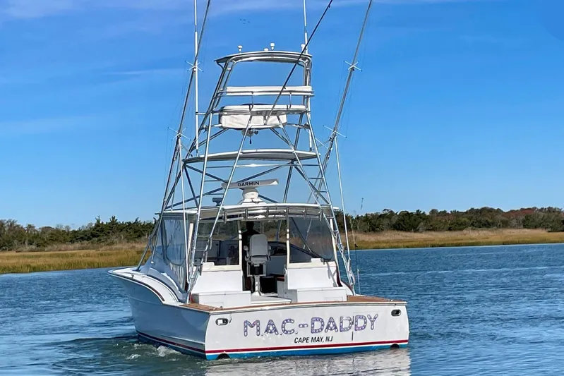 M.a.c. Daddy Yacht Photos Pics Custom 2005 DeSanti Carolina Express boat on water, labeled "MAC-DADDY," Cape May, NJ.