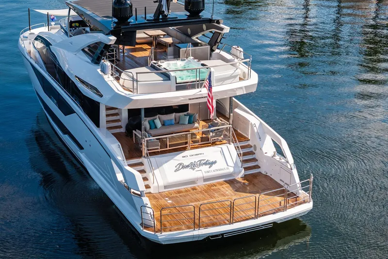 Don Tortuga Yacht Photos Pics Luxurious 2024 Sunseeker Ocean 90 yacht with spacious deck and elegant design on the water.