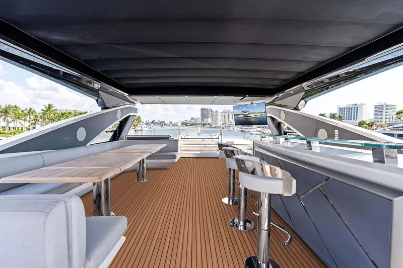Don Tortuga Yacht Photos Pics Luxurious 2024 Sunseeker Ocean 90 yacht interior with elegant seating and bar area.