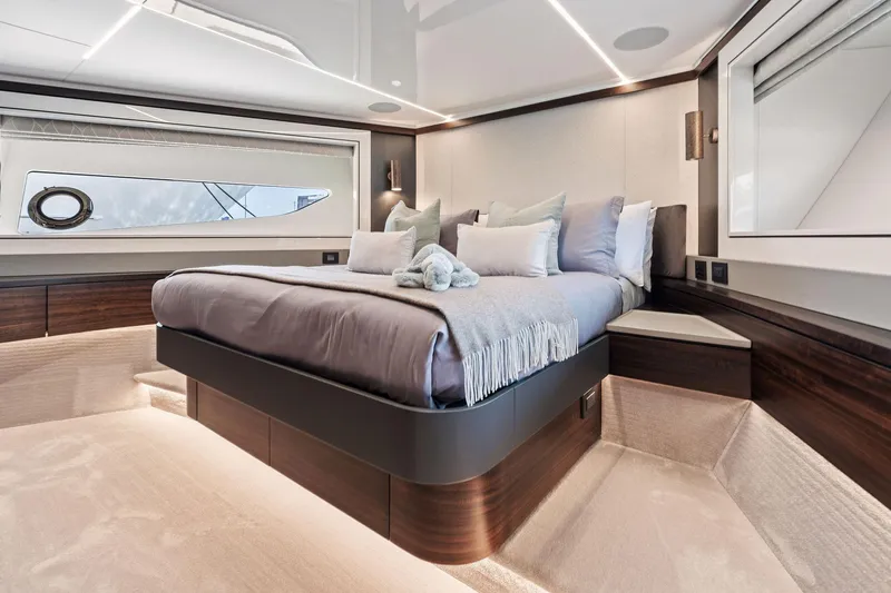 Don Tortuga Yacht Photos Pics Luxurious bedroom interior of 2024 Sunseeker Ocean 90 yacht with modern design.
