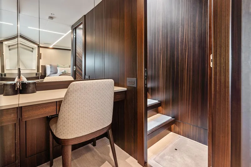 Don Tortuga Yacht Photos Pics Luxurious interior of 2024 Sunseeker Ocean 90 yacht with elegant wood finishes.