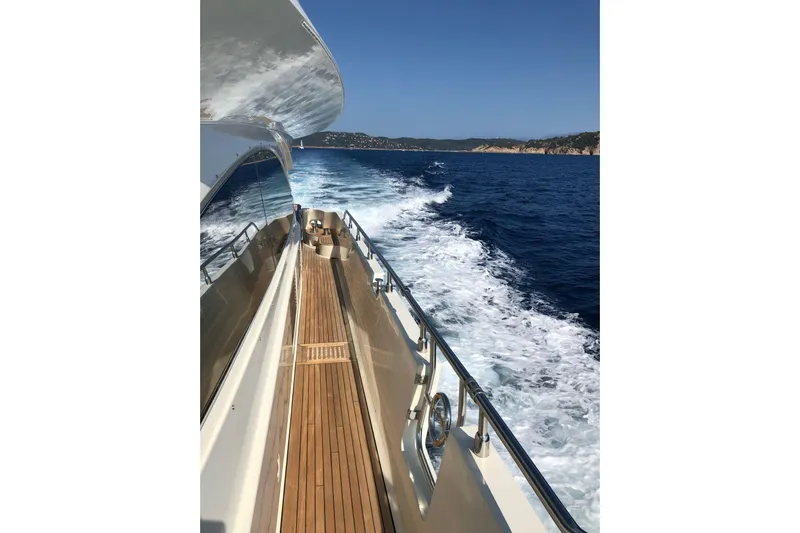  Yacht Photos Pics Luxurious Mochi 2250 yacht cruising on open sea, 2003 model.