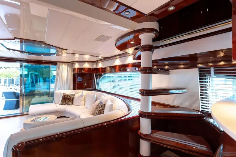  Yacht Photos Pics Luxurious Mochi 2250 yacht interior with elegant seating and spiral staircase, 2003 model.