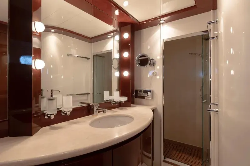  Yacht Photos Pics Luxurious yacht bathroom with modern fixtures, glass shower, and elegant lighting, Mochi 2250, 2003.