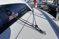 2022 Dehler 30 sailboat deck with rigging details in a marina setting.