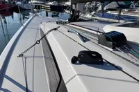 Dehler 30 sailboat deck, 2022 model, featuring rigging and marina background.