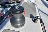 Winch on 2022 Dehler 30 sailboat deck with ropes and fittings.