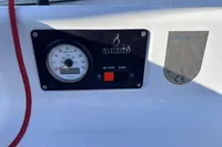 Control panel of a 2022 Dehler 30 sailboat with gauge and start button.