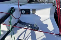 Cockpit of 2022 Dehler 30 sailboat with control panel and rigging.