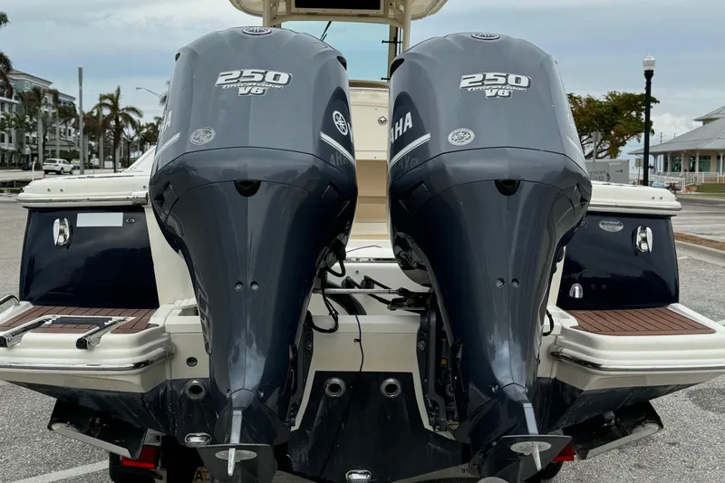  Yacht Photos Pics 2011 Scout 282 XSF boat with twin 250 V6 engines at dock.