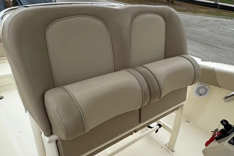  Yacht Photos Pics 2011 Scout 282 XSF boat seat with beige upholstery, showcasing comfortable design.