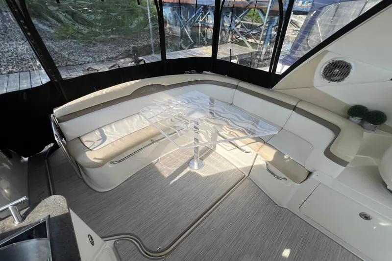  Yacht Photos Pics Interior of 2012 Sea Ray 370 Sundancer with elegant seating and glass table.